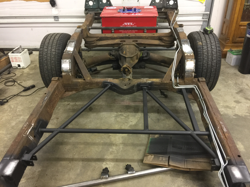 Floor modifications, before the roll cage went in.
